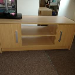 Tv stand, excellent condition. No chips or marks. Cupboards have removable shelves in. It's quite heavy.