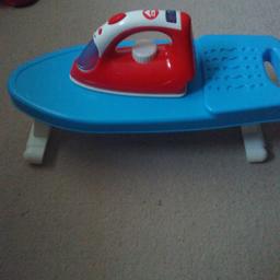 child's ironing board and iron