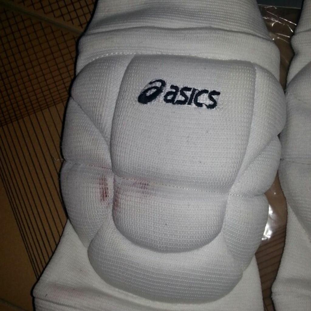 Ginocchiere shop asics bianche