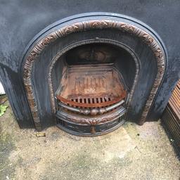 Heavy cast iron fire place needs a good clean because it has been sitting out side