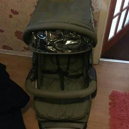 khaki green pram forward facing. 3 wheeler.new condition only been used a few times great condition . also comes with rain cover.. £50.00
