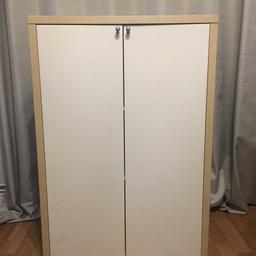 Approximate measurements:
Width: 69 cm / 27 inches
Height: 1 m / 39.5 inches
Depth: 40 cm / 16 inches
3 shelves inside. White doors with small silver handles. The rest of the cabinet is a light wood colour. Very minor wear and tear the only obvious one you can see in the picture is a small dent on the side. Pick up from London NW4 only.