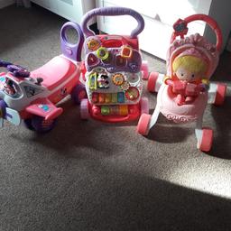 Pushchair with doll,plays music. Vtech walker also plays music and Minnie mouse ride along which also makes noises. Collection b44. £15 the lot