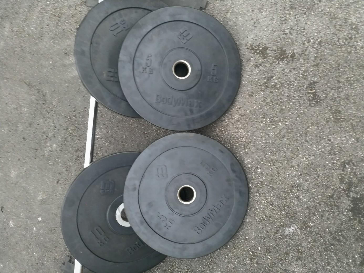 Weights olympic bar and bumper plates in BD12 Bradford for £175.00