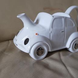 white volkswagen beetle teapot, mint condition but lid missing. license plate says CW 288

£10 collected, £15 posted.

ideal gift for volkswagen enthusiast