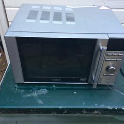 Hi selling this microwave works fine little dint on top and few scatches