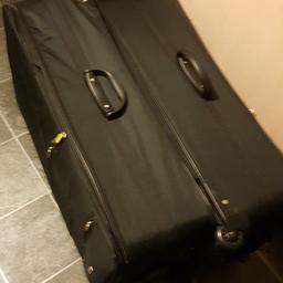 2 x Dunlop suit case used once good bog size for family holidays full working order no rips brilliant condition