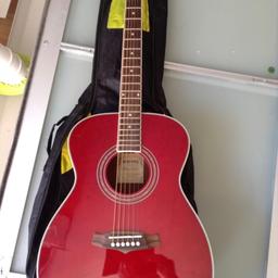 Lovely guitar hardly used the make is on the second photo from a smoke free and pet free home