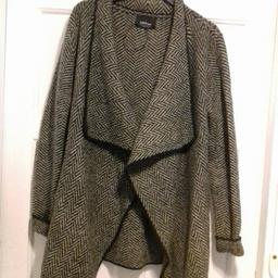 warm wool jacket size small. Nice and warm. Can be worn with dress or trousers. Great for autumn.