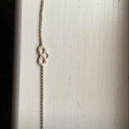 Hardly been worn, great condition. Cute Infinity bracelet.
