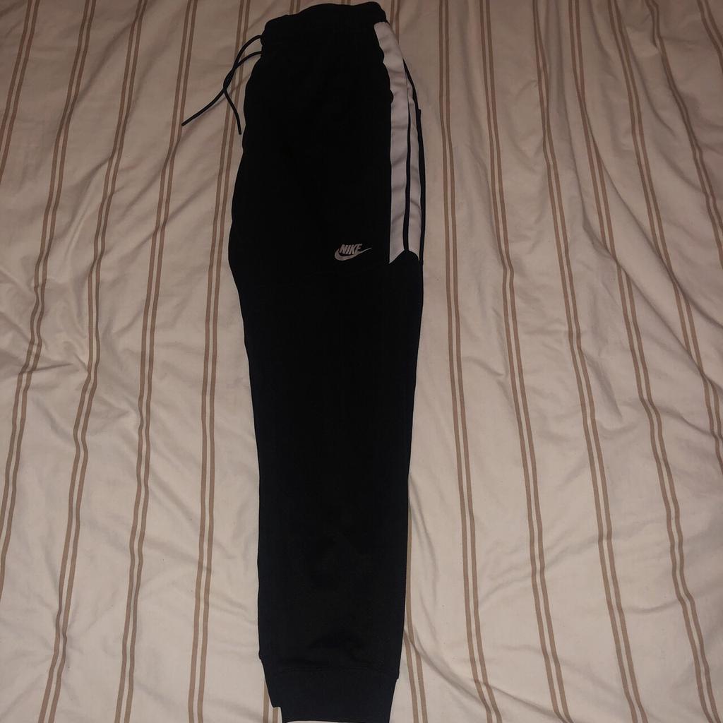 Nike tribute shop poly joggers