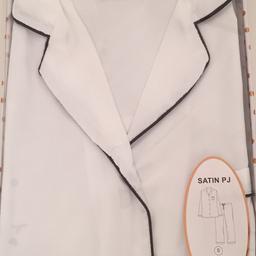 Brand New. Never Worn.

White satin pj’s with black lining detail. Size 6-8. 

COLLECTION OR LOCAL DROP OFF ONLY.
Also available to Stevenage/SG2-Hertfordshire.