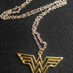 This is a gold plated wonder woman pendant necklace and is supplied in a clear plastic bag. 

Necklace is brand new and is £3.50

Collection from Crewe, Cheshire.

Any questions or queries please do not hesitate to ask.