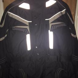 A nearly new motorcycle jacket size L