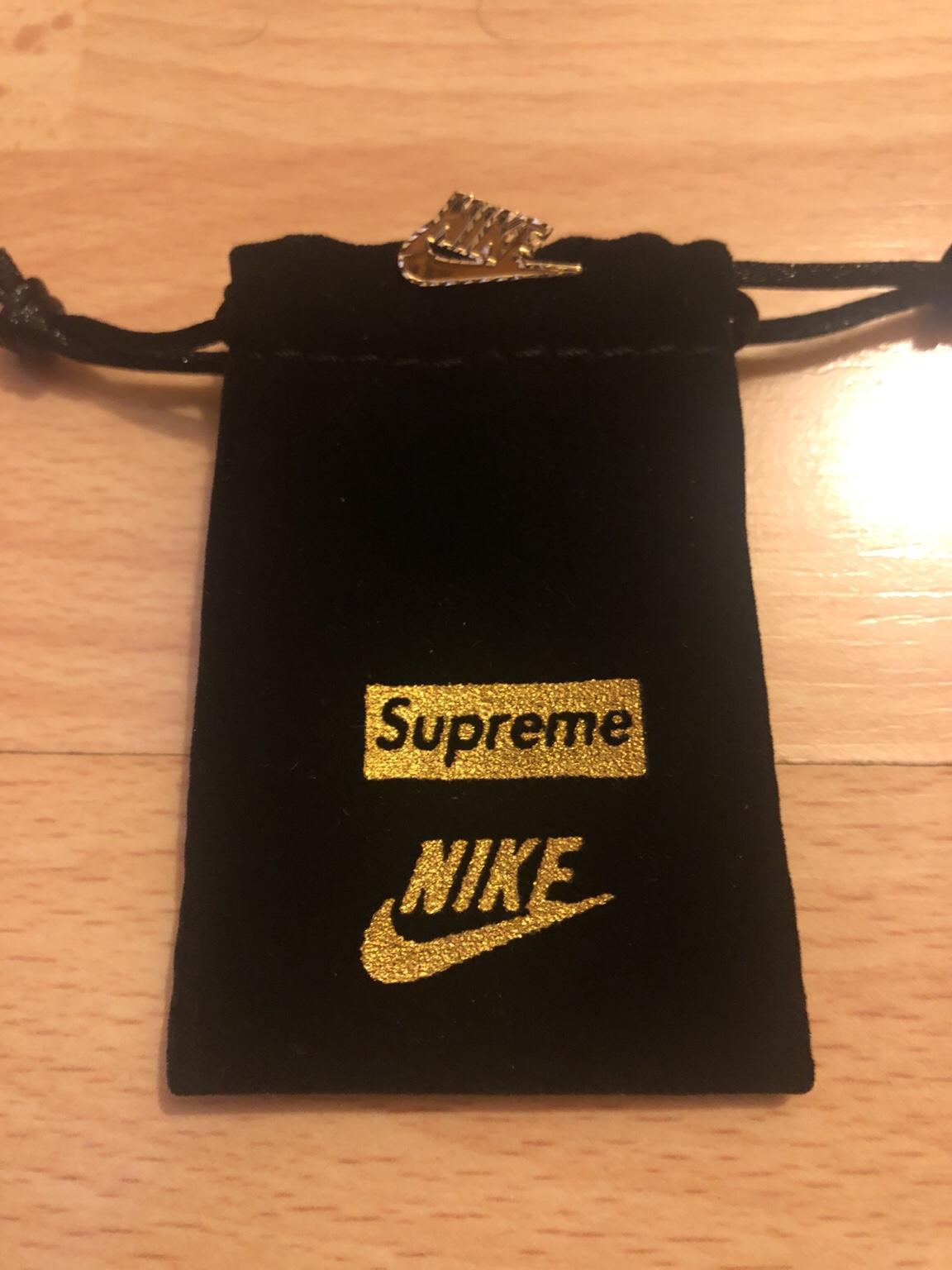 Nike supreme earrings sales