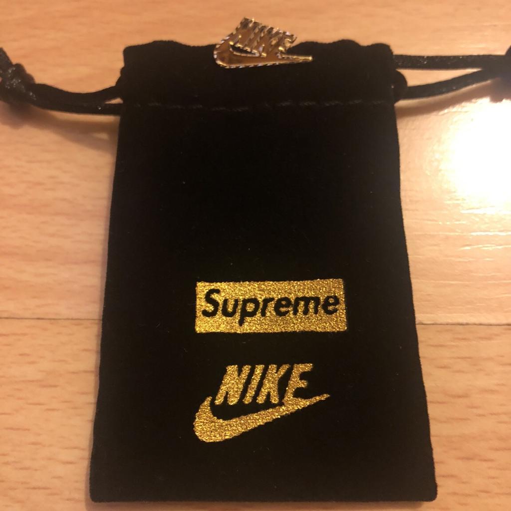 Supreme x hot sale nike earring