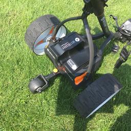 Here we have the new shaped motor caddy graphite, InColor a lithium battery and the remote control has got a lithium chargeable battery in it as well.comes with umbrella holder and satnav holder ,card holder