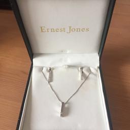 Beautiful necklace and earrings. Great condition. White gold with real diamonds in both necklace and earrings. Lovely gift.