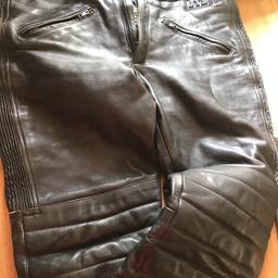 A pair of good quality size 34 motorcycle trousers zip oiler has broken but work fine with added pulls.