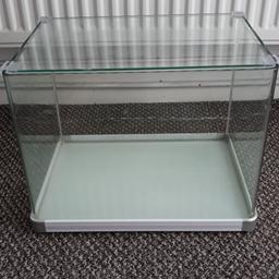 In good used condition. Size is 38cm x 28cm x 30cm. ideal for kids or a starter aquarium
