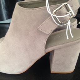 Grey, brand new with tags. Size 5