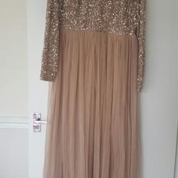Size Eur 44/16. Can be worn as maternity dress too. Worn and in excellent condition . Can post it if desired. Thank you for looking.