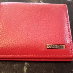 Used walled from Calvin Klein, it is an original product. Red color with grey interior.
Material: leather.
I can post.