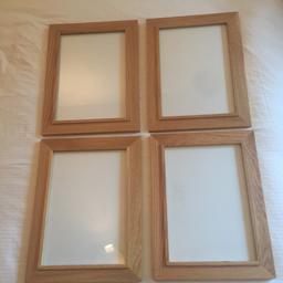 7 x Real Oak Wooden Photo / Picture Frames. Various sizes (see below). In excellent condition. £20 for the lot. From a smoke and pet free home. All are suitable for wall mounting only, landscape or portrait.
 
4 x single photo frames – holds one large photo, 21x29cm
2 x triple photo frames – holds three photos, 10x15cm each
1 x quad photo frame – holds four photos, 2 of 10x15cm and 2 of 13x18cm
