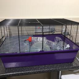 Hamster cage. Used for a month. Tubes to go around but the end ones are missing. Didn’t make a difference to our hamster. Water bottle and food bowl and wheel included.