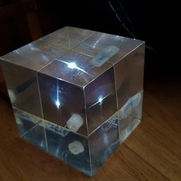 Habitat Plugg LED cube light.

Made from a solid cube of perspex with a single bright white LED in the centre.

 9.5 cm. x 9.5 cm. x 9.5 cm.