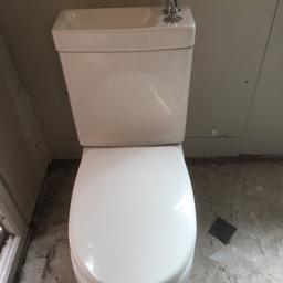 Toilet with sink attached ideal for small rooms