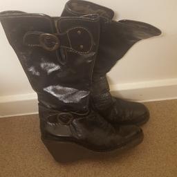 Soar to new heights in these fab patent wedge Fly boots. UK size 7. Worn a few times. A fly box and bag is available for the boots.