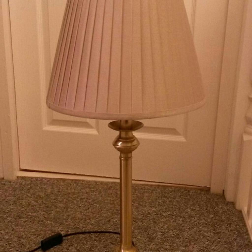 Tall table lamp in brass and gold