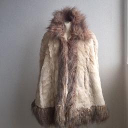 Cream and brown fur trim fur poncho new never been worn