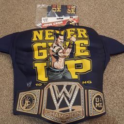 John Cena wrestling dress up top with wrist sweat bands
Ages 4-6