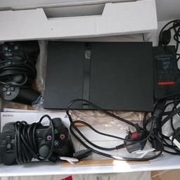 Good condition all works and can be seen working comes with 2pads 3memory cards and about 100 games in a CD case some are ps1 but work on ps2 without issues ideal for retro gaming