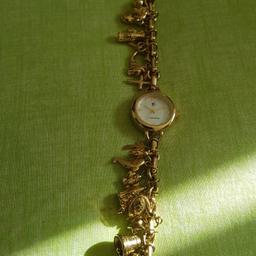 gold plated charm bracelet never worn beautiful ivory face