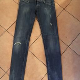 Jeans donna blu scuro, elasticizzato a vita bassa. Taglia 27 ( 40/42), marca Diesel