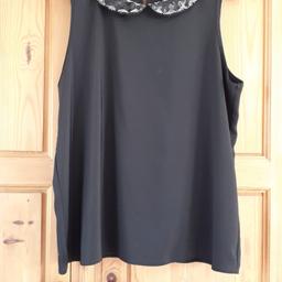 Size 18 Black swing top.
With split back and attached lining.
99% polyester and 1% Elastane.
Excellent condition .