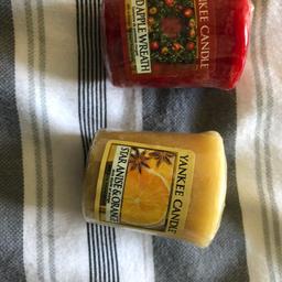 1x Red Apple Wreath and 1x Star Anise & Orange mini Yankee Candles. never used, still in packaging.