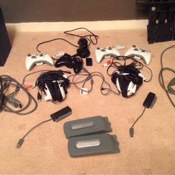 1 x 250GB HD
1 x 60GB HD
2 x Ear Force Turtle Beach X11's (both inc splitter junctions)
2 x Wireless Network Adapters.
4 x Wireless Controllers
7 x Controller Battery Packs
1 x Dual Battery Charger
1 x Wired Battery Charger
1 x Xbox 360'Power Bank & Cables (240v)
1 x HD AV Cables
1 x HDMI Lead

Everything is in full working order but everything is also a few years old now so showing signs of age wear and tear (the rubber over the controller sticks are worn worst of all - see images)