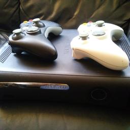 Xbox 360 Elite 120gb with all leads(HDMI, power, internet), 2 controllers(original black and white) and 75 games( 65 on discs and 10 on HDD). Everything  working fine, can be see working. 
Games on HDD: Batman Arkham City, Dark Souls 2, Devil May Cry HD Collection, Fallout 3, Halo 3, Marvel vs Capcom 2, Metro 2033, Metro Last Light, Soul Calibur 5 and Super Street Fighter 4.