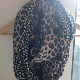 Im selling off my sample stock to make way for new! This beautifully reversible leopard and spot print scarf RRP £55. All.smaple items are new and unused.
