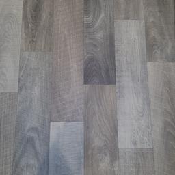 wood effect cushion flooring 
6ft 4in wide x  13ft 6 in long

Or 1.82m wide x 4.1 m long

cost £85  but change of plan brand new never been laid.