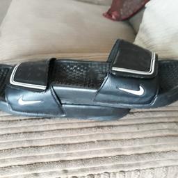 Black Nike sliders
size 2.5