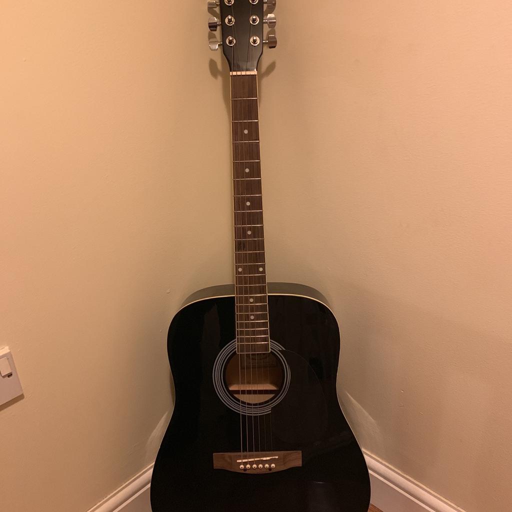 C giant store acoustic guitar