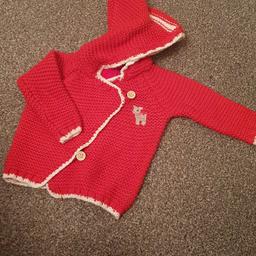 next red knitted withnpom pom hood and reindeer motif. vgc.  smoke free home.  collection beechwood.
