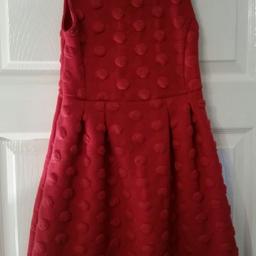 Beautiful red dress. From M & Co. age 8-9. from a smoke and pet free home.