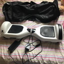 Fully working Bluetooth hoverboard. Used, condition but one black strip have come
Off the side as show in pics. Hence price.comes with carry case and charger.
