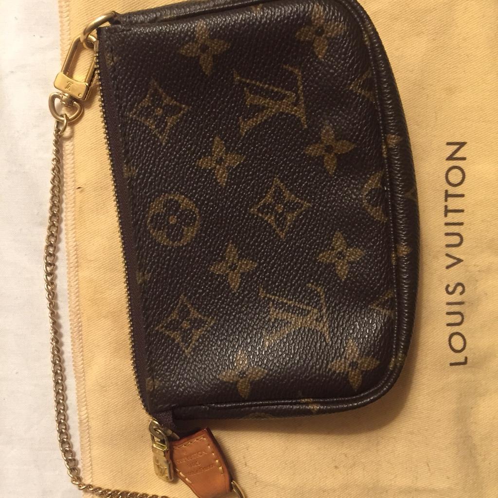 Mini pochette sale louis vuitton usata